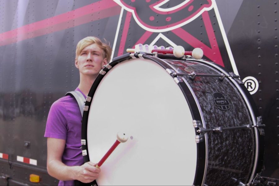 Coppell High School senior bass drummer Cooper Wiethoff stands taller than his peers on the Coppell Drumline. While his height sets him apart, through leadership and talent, Wiethoff will march with the Sacramento Mandarins over the summer. 