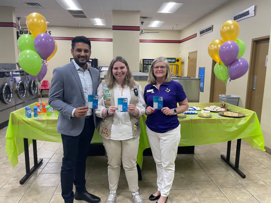 LOADS OF SUPPORT. Xpress Laundry's Sam Prasla, senior Sonia Harper and WISD Director of Special Programs Debbie Walker kick off the Loads of Love Program at XPress Laundry in Willis.