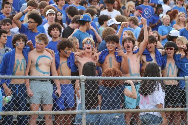 CHEERS AND CHESTS: Freshmen cheer on the Knights with “McCallum” written across their chests in blue paint. Freshman Hugo Smith said the shirtless display of spirit was a spur-of-the-moment decision.

“Everyone in our row that we were sitting with participated,” Smith said. “We just told everyone ‘Take your shirt off. Write your letter.’”

Smith said he knew the Knights needed some spirit to get through the game. 

“It says that I care about my team,” Smith said.

Caption by Julia Copas with reporting by Ingrid Smith.