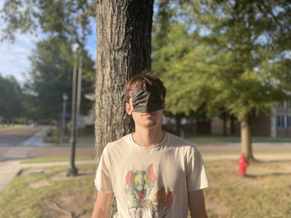 Senior Sebastian Harvey stands masked on MSMS campus. During Orientation Week, MSMS experienced an outbreak of COVID-19 cases, causing approximately 30 people to be sent home.