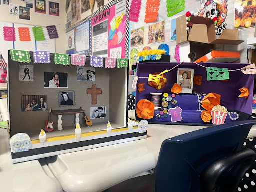 Alexandra Lopez Jimenez shows her students Día de los Muertos projects displayed in her classroom. Every year near the time of Day of the Dead, Lopez Jimenez makes her students create “Ofrendas” to present and share with the class. (Photo courtesy of Olivia Garcia)