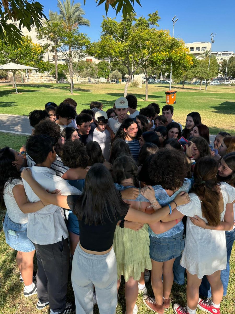 The+46+American+and+Israeli+teens+of+Yallah+Israel%21+Bus+2+hug+before+saying+goodbye+to+our+Israeli+friends+for+the+last+time.+Leaving+Israel+this+summer%C2%A0was+one+of+the+hardest+things+Ive+had+to+do.+Even+after+only+knowing+my+Israeli+friends+for+one+week%2C+nothing+upsets+me+more+than+seeing+their+beautiful+country+being+destroyed.