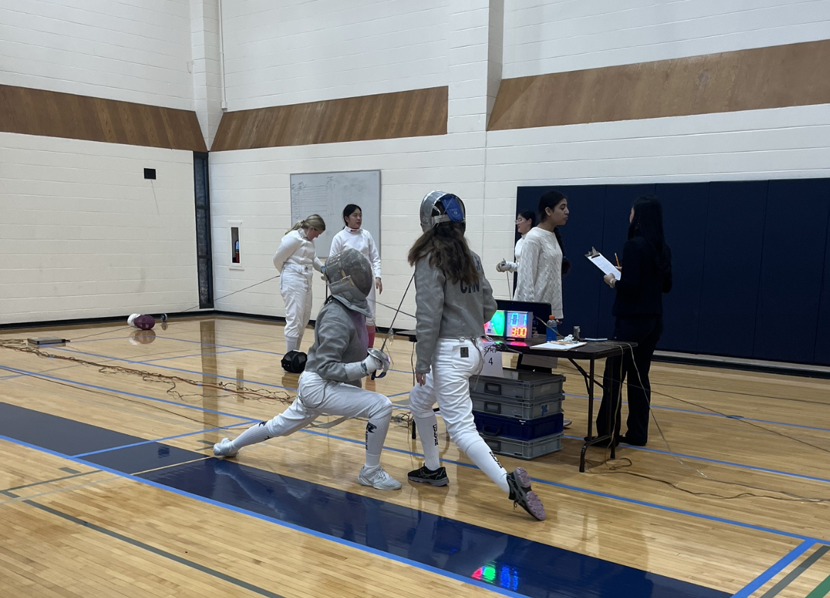 Senior+saber+fencer+Yunqing+Han+jabs+Culver+Academy+opponent+to+take+3-1+match+lead+on+Dec.+2+meet+at+New+Trier