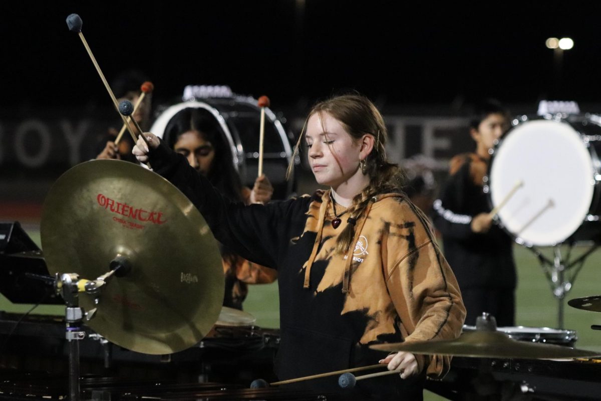 Coppell+junior+percussionist+Sophie+Depew+performs+%E2%80%9CAn+Ancient+Observer%E2%80%9D+at+halftime+on+Nov.+10.+Depew+won+the+Percussive+Arts+Society+Texas+Chapter%E2%80%99s+Day+of+Percussion+high+school+individual+competition+in+April+for+her+marimba+performance+and+plans+to+go+into+the+music+field+after+high+school.