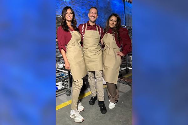 Class of 2011 graduate Charles Zimmerman (middle) is paired with Bonne Bedingfield (left) and Rabiha Sami (right) to form the Sugar Bandits, a culinary arts team on Holiday Wars. Team Sugar Bandits went into the finale and finished 2nd out of nine teams.