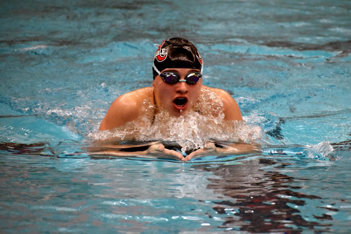 Senior+Grey+Davis+glides+through+the+water+during+the+breaststroke+portion+of+the+girls+200+IM+at+the+2023+Ben+Hair+Swim+Meet.+Davis+went+on+to+become+the+state+champion+in+100+butterfly+and+backstroke+last+year.++