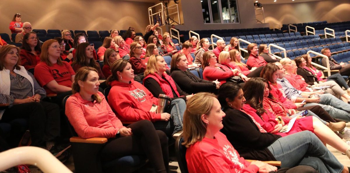 Teachers associated with RNEA attend the Board of Education meeting on Thursday, Feb. 22, to emphasize need for more support staff in the district. 