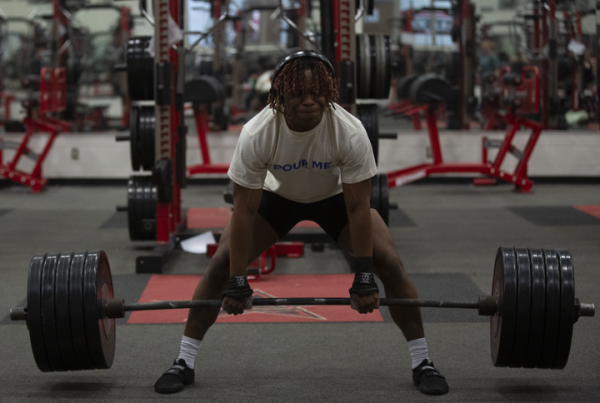 Coppell junior powerlifter Caden Golden deadlifts in the Coppell High School Field House weight room. Golden started competing in powerlifting in January and will compete at the USA Powerlifting Raw Nationals in September. 