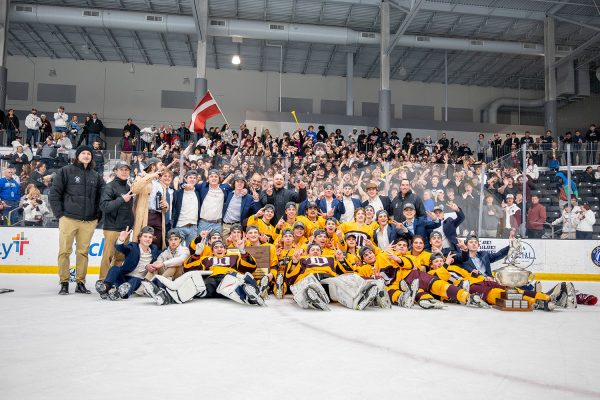 The team poses with the fans to celebrate their second-straight Challenge Cup Championship. It was the Spartans 16th title.