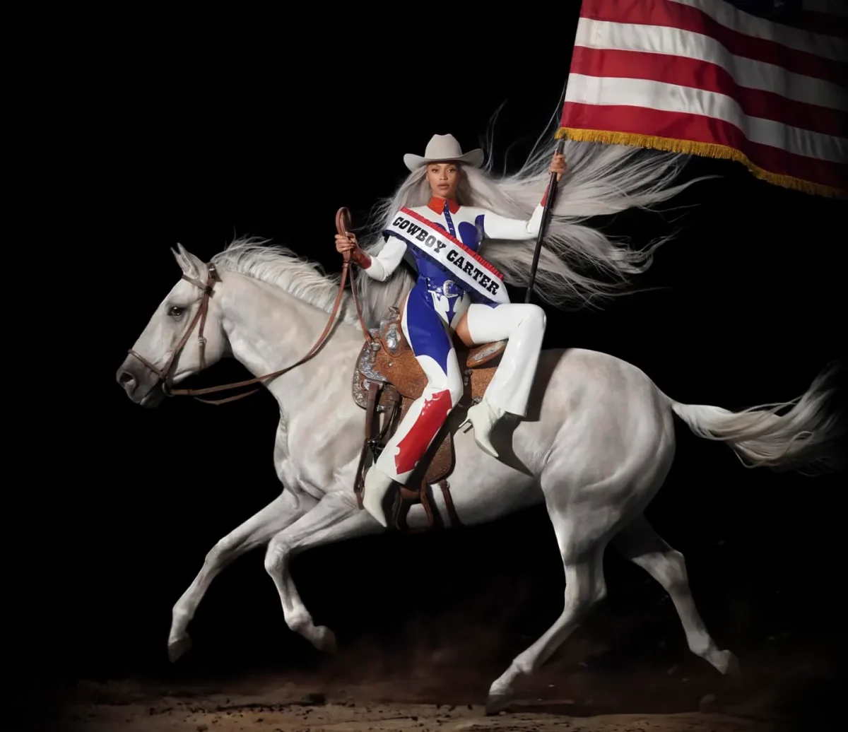 The album cover for Cowboy Carter features Beyonce on a white horse in full patriotic display. (Courtesy of Columbia Records)