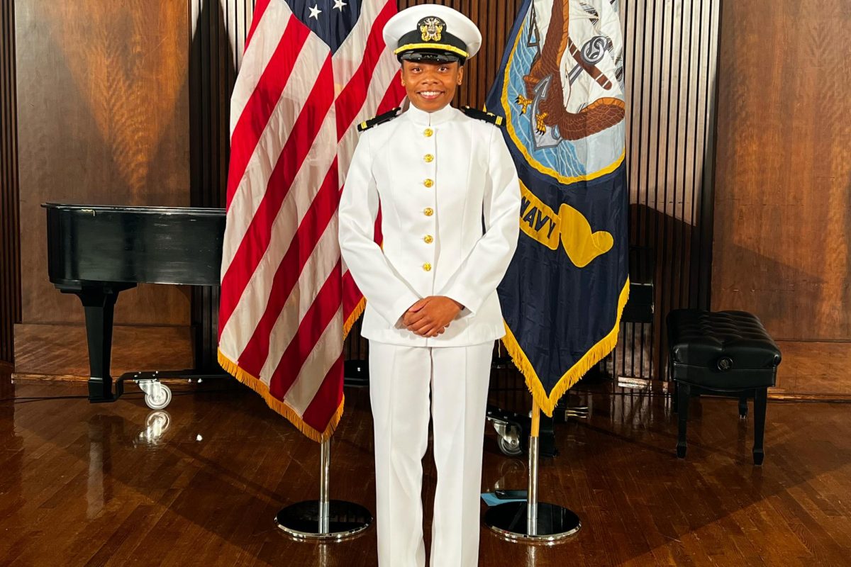 Gabrielle+Cain+stands+at+her+graduation+in+Naval+Academy+outfit.+She+graduated+from+flight+school+and+became+a+Naval+Aviator%C2%A0in+2023.+Photo+provided+by+Gabrielle+Cain.+