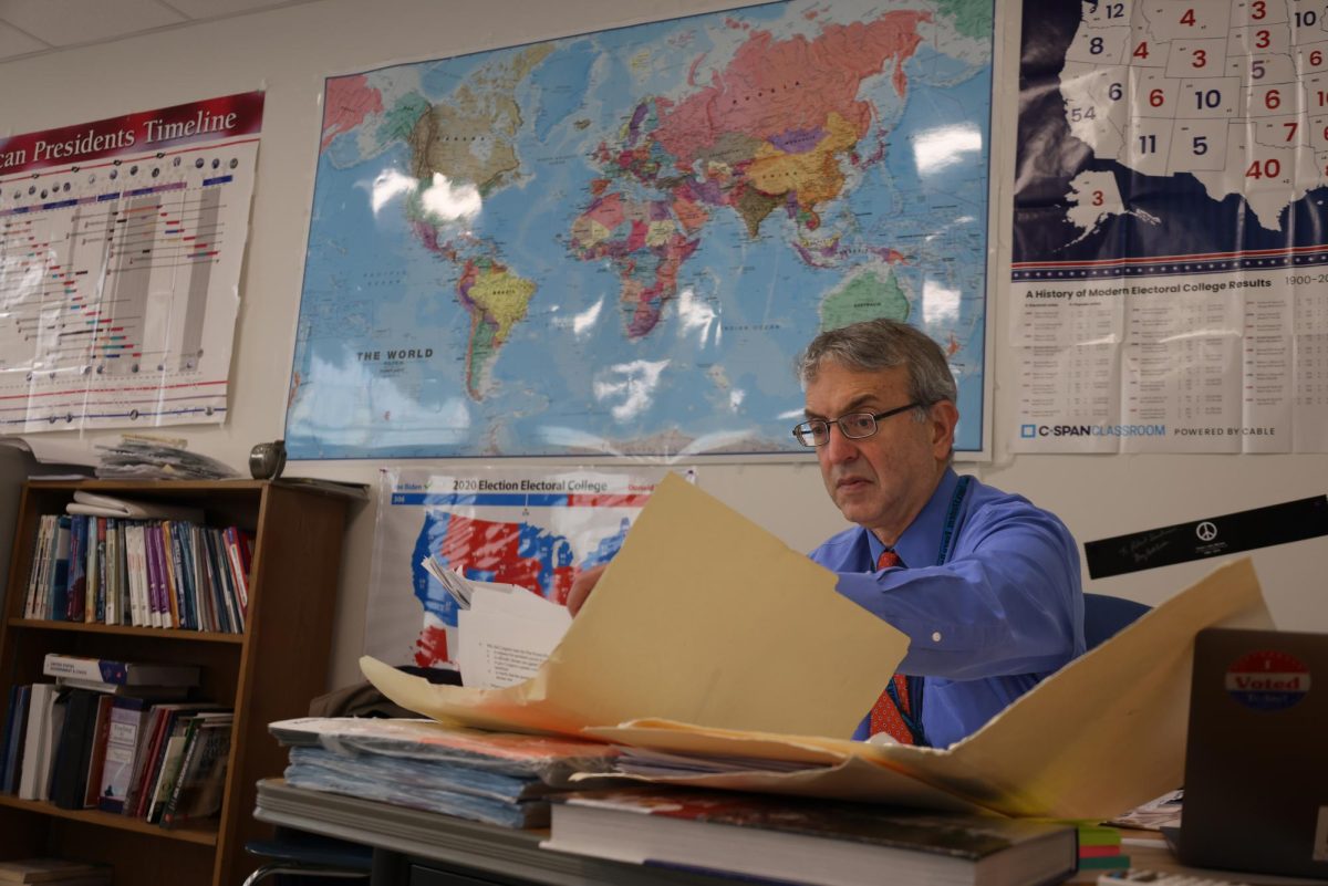 Teacher Robert Snidman grades papers after school. Prior to teaching at Ladue, Snidman faced unexpected adversity at Hazelwood. “[There was] open drug dealing in the bathrooms and in the back of classrooms, Snidman said. I did my best for five years.