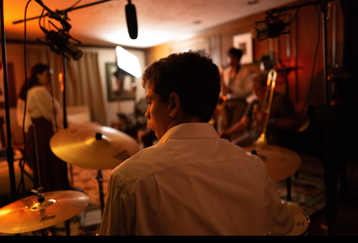 NASH junior David Cobbey on the set of The Lounge. "It was really neat getting to work with so many unfamiliar faces and see how the song came together collectively despite us never practicing together," Cobbey said.