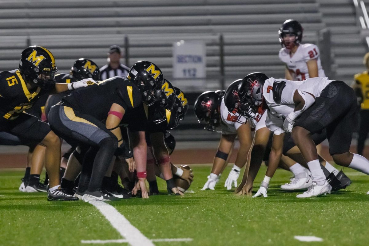 With Memorial lined up for a field goal, the teams square off against each other before the ball is snapped. The Redhawks go on to block the field goal attempt helping the Redhawks hold Memorial to just seven points the whole night.