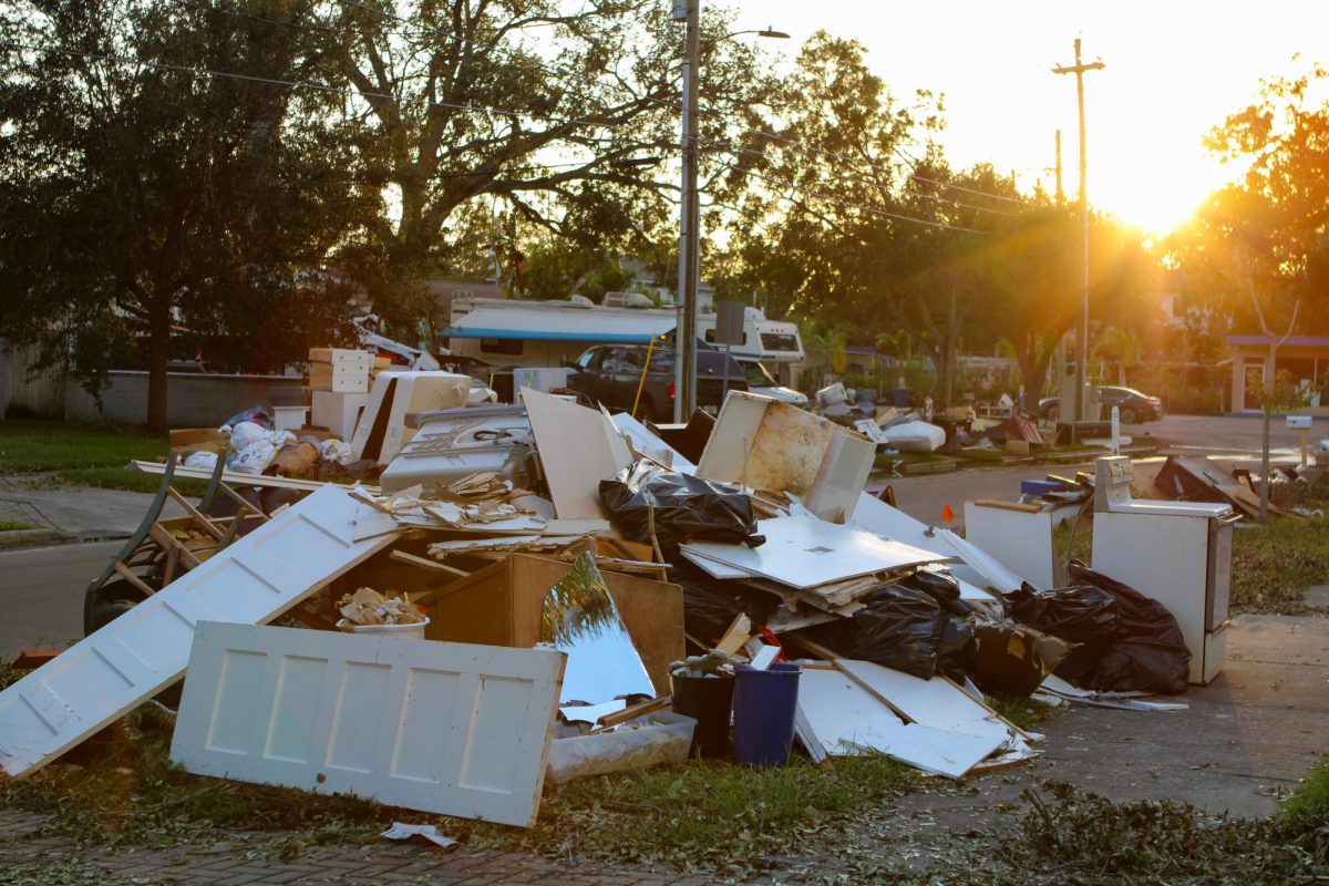 Devastation follows Hurricanes Helene and Milton, leaving homes and communities in ruin. Piles of debris litter the streets days after the storms in Tampa, Florida.