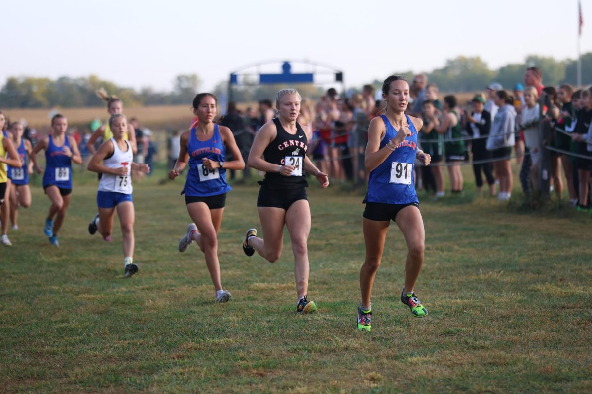 Senior Hallie Mimbela runs the opening stretch of the Johnson County Championship on September 21, 2024. Mimbela would finish sixth, and the girls' cross country team would win their first County title in four years.