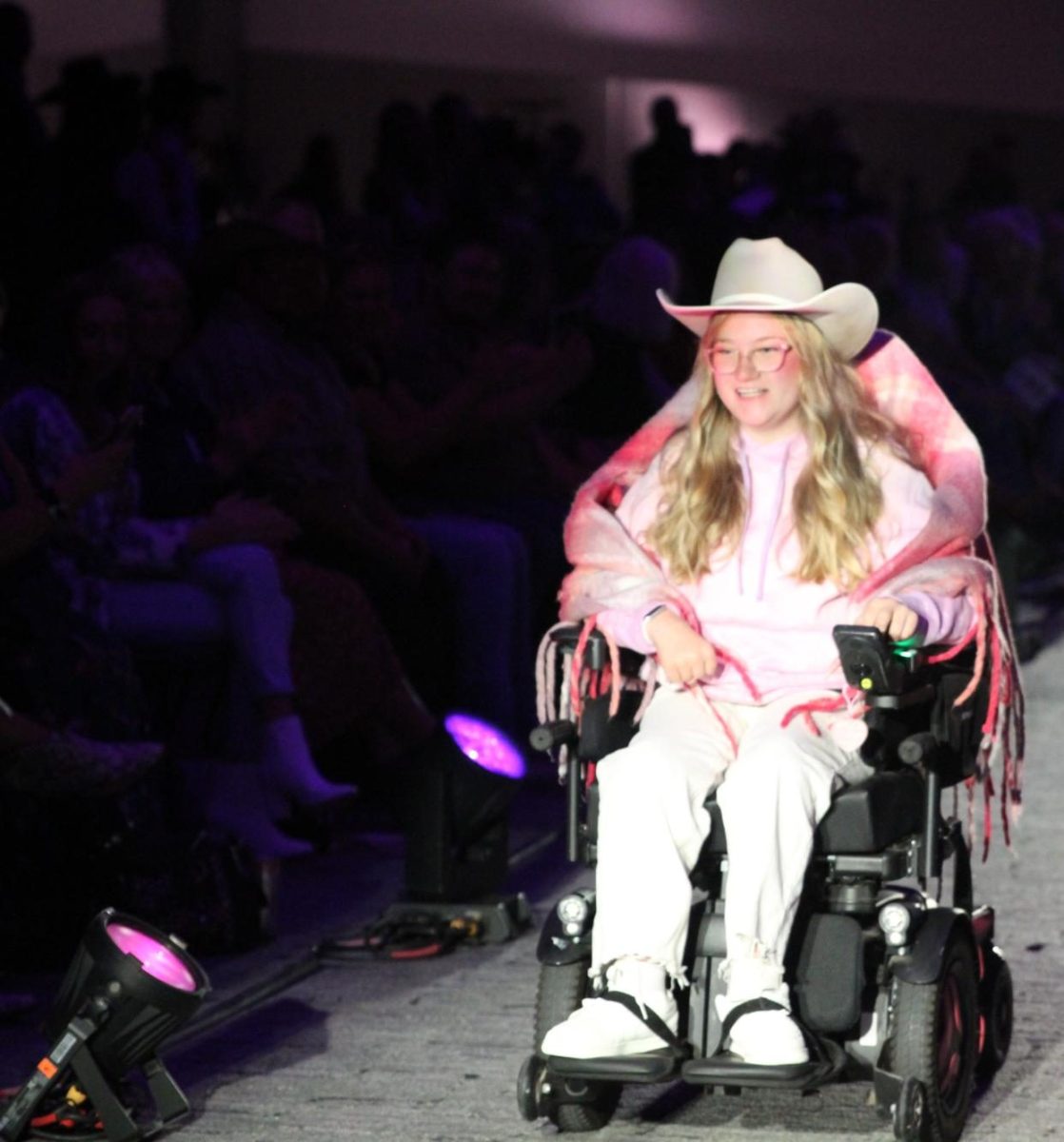 Model Preslee Asay traverses the runway. She is a 16-year-old sophomore attending Williamsburg Academy of Colorado and is a former Weld RE-4 student.