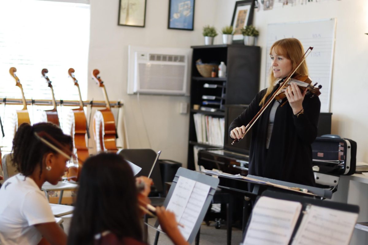 Archer's orchestra director Hannah Murray plays her violin with the middle school advanced ensemble, the Metro-Gnomes. This is Murray’s first year at Archer, following the retirement of Susan Smith, who served as orchestra director for 23 years.