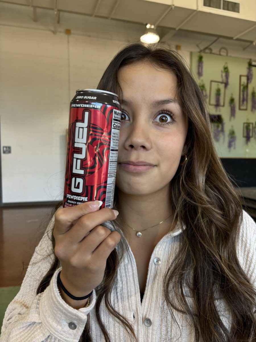 Colette Morell (‘25) holds an empty energy drink can, shocked by the news of the ban. “I was surprised they went as far as banning the drinks but I get my caffeine from coffee so it doesn’t really affect me,” Morell said. “I don’t think it’s a bad thing at all that admin made the decision.”