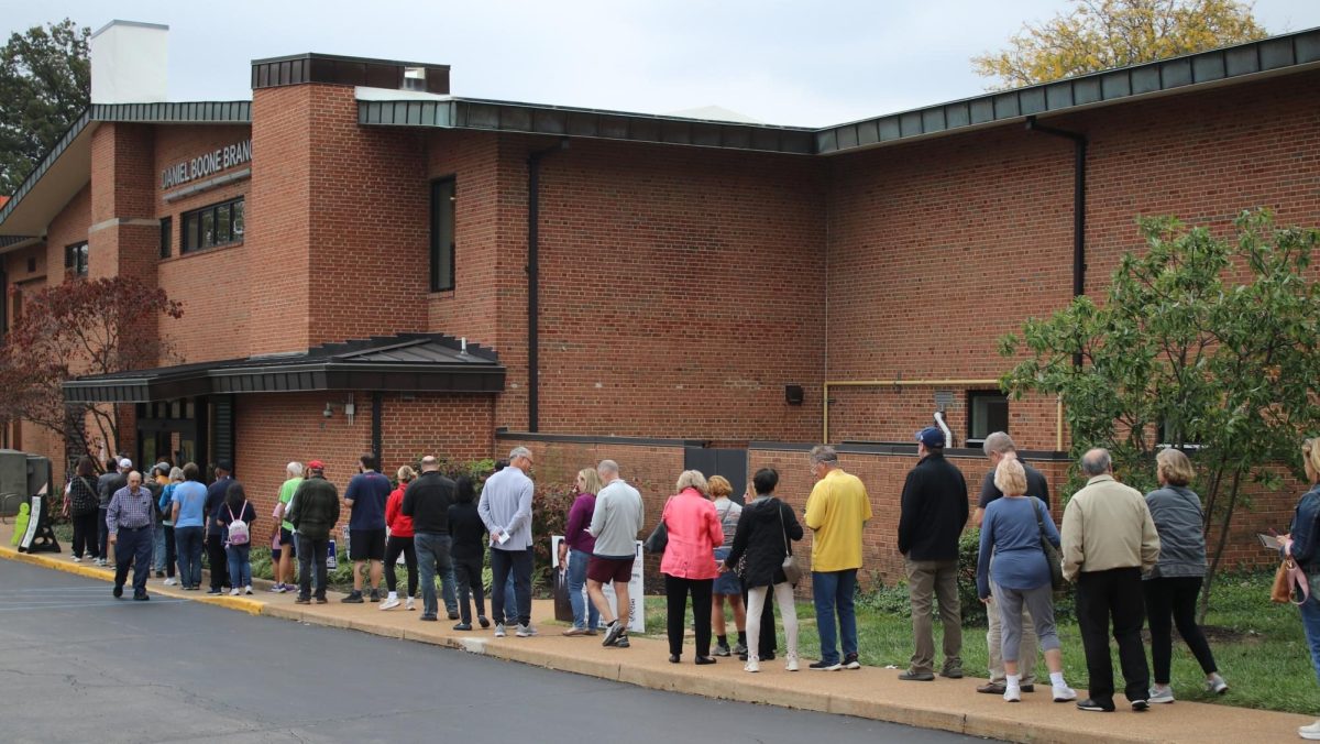 St. Louis County residents line up outside the Daniel Boone St. Louis County Library Branch to cast their vote early on the afternoon of Friday, Oct. 25. In-person voting started early this year on Tuesday, Oct. 22, and will go until election day. 