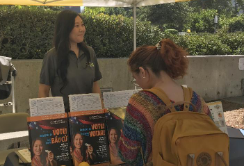 To promote civic engagement, the Orange County Registrar of Voters has been setting up information booths like this one at the University of California, Irvine, on Thursday, Oct. 10. Those eligible to cast a ballot but haven't registered can still do so on Election Day Tuesday, Nov. 5, by visiting any voting center in the state.  