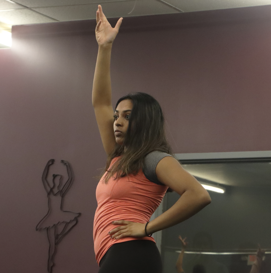 Senior Akki Gundu practicing for the Seva Dance INfusion performance Nov. 3. “[Seva Dance has] allowed me to express my love for dancing and for my culture, which I don't get to do a lot, so it's kind of special,” Gundu said. (This image has been horizontally flipped.)