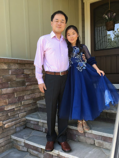 Kai Chen and her father in preparation for the daddy-daughter dance, 2019. Chen looks back on this day as on of their best moments.