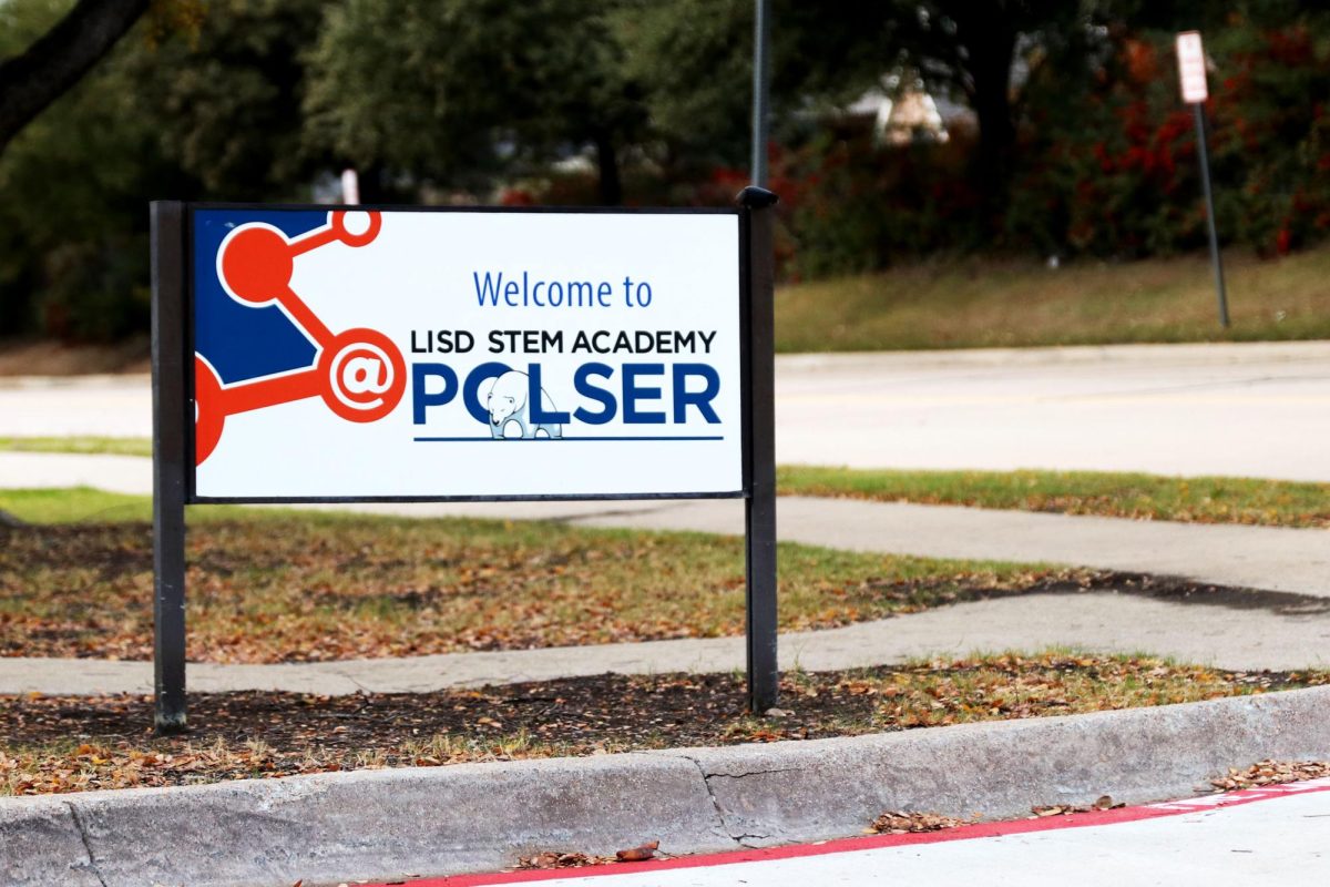 A sign sits in front of Polser Elementary School - Stem Academy. The school is one of the five elementary schools the school board voted to retire next school year. 