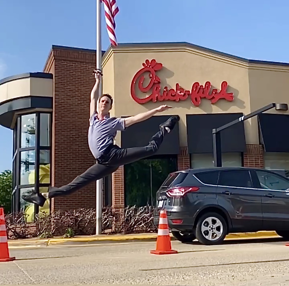 Adam Boreland gives the Chic-fil-A drive-through customers a five-star performance.