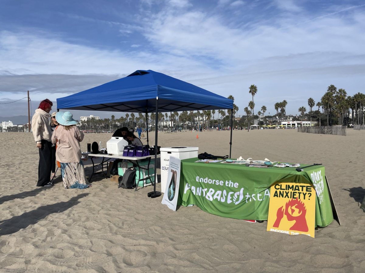 The Save our Surf beach tent in Santa Monica. The organization welcomed people from all over LA to come and pick up trash from 11-1. Archer students like Katie Ray McKillop ('27) volunteer for a variety of beach cleanups like Save Our Surf. "I think there's more trash on the beach that at least I can see, but it's really a problem," she said. "I mean, there's a lot of trash deeper in the ocean past, where I go and that affects sea creatures."