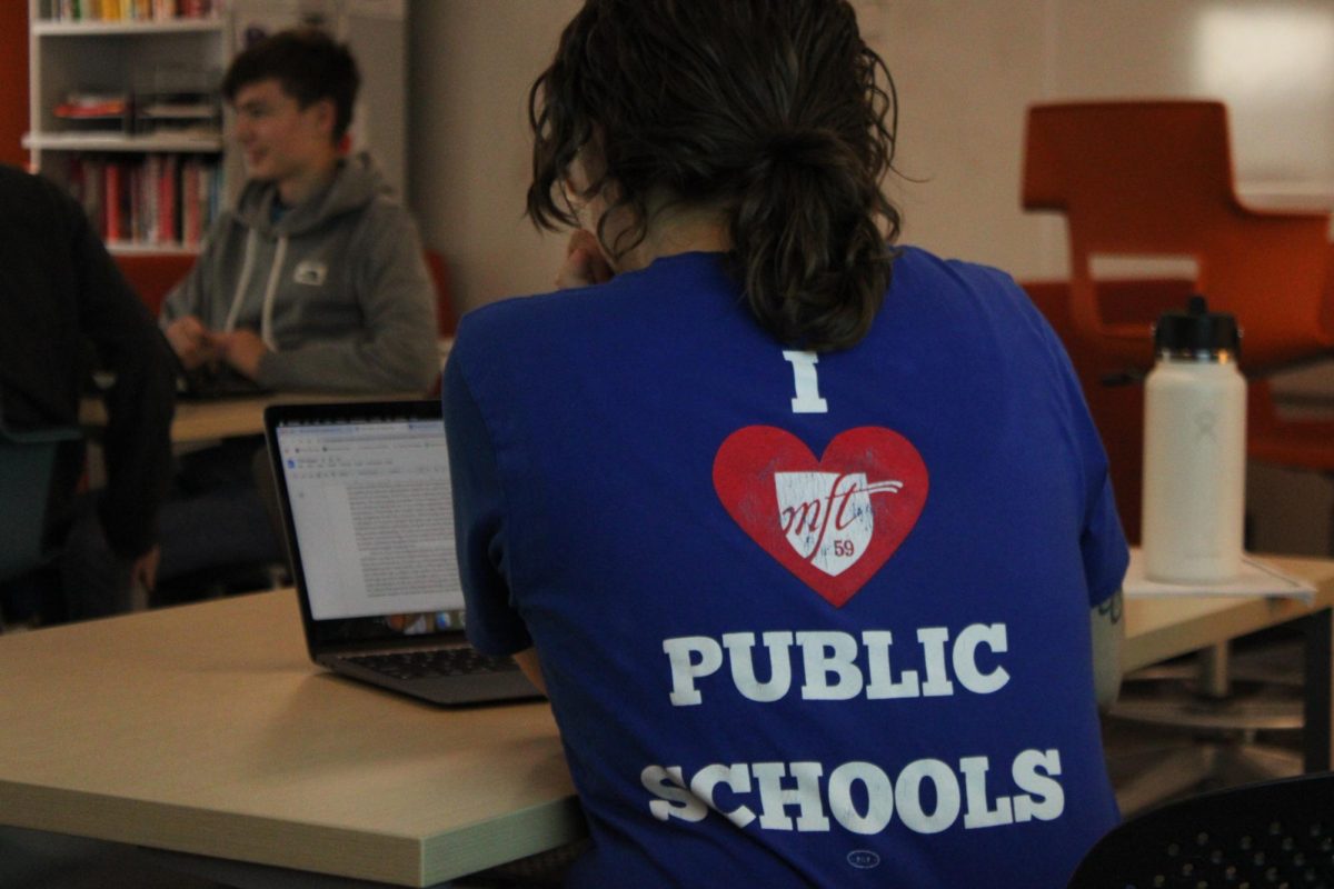 Park teacher wears a union T-shirt Dec. 20. Teachers have been wearing black on Wednesdays to demonstrate the strength of their union.