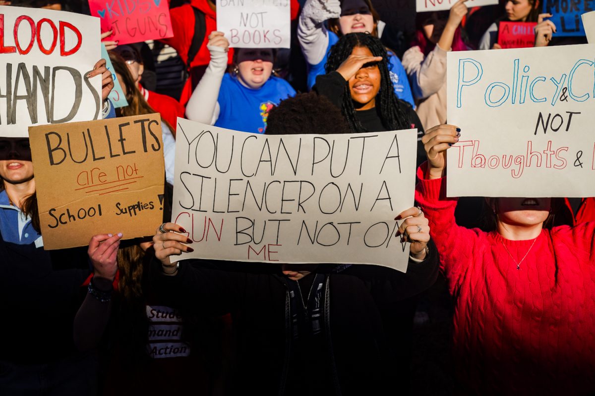 Protestors at the rally hold signs in front of the Tennessee capitol building, as photographed on Jan. 27, 2025. (Hustler Multimedia/Miguel Beristain)