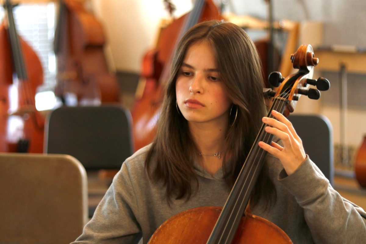 Junior Chloe Kirk rehearses "The Moldau" by Smetana with the upper school orchestra. Kirk was accepted into the Composer Fellowship Program with the LA Philharmonic, where she plans to hone her orchestral skills through creating original pieces.