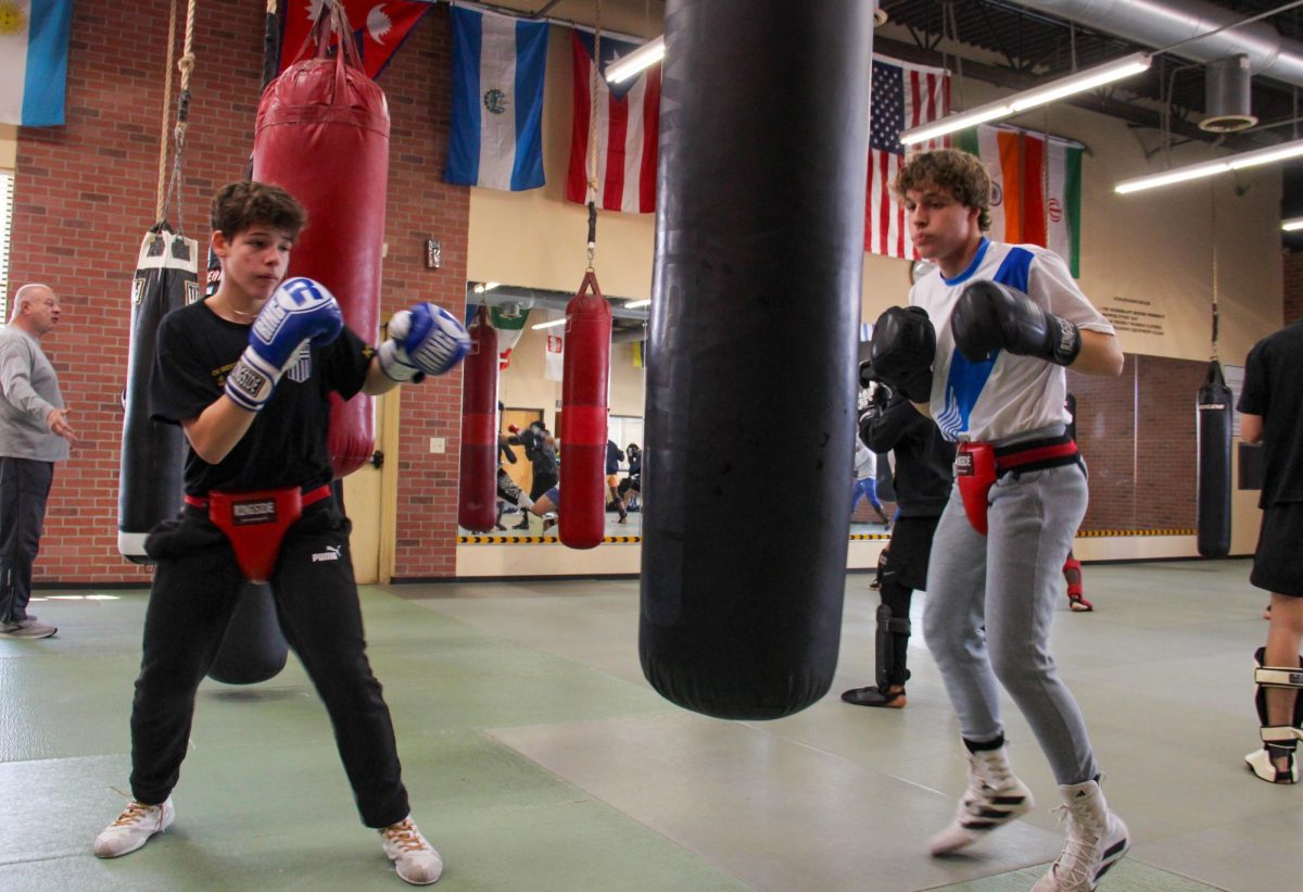 Coppell High School sophomore Dimitrios Panagiotopoulos and his brother senior Ionnais Panagiotopoulos are training to become USA Boxing certified boxers. They have been boxing for four years and built a bond through boxing and training together. Photo by Elizabeth De Santiago.