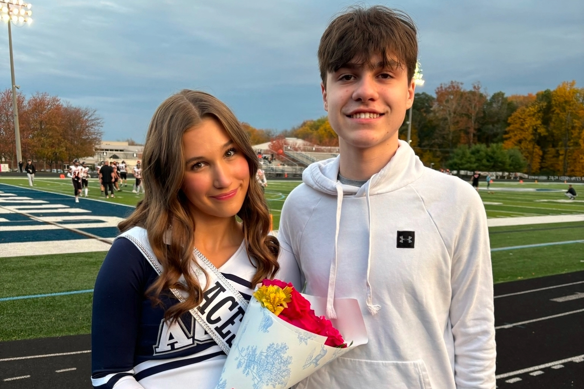 Graycen and Philip Vogelmeier pose at Graycen's senior night on Oct. 25, 2024. Philip, a freshman, says he looks up to the sister who donated her bone marrow to him ten years ago. Photo courtesy of Graycen Volgelmeier.