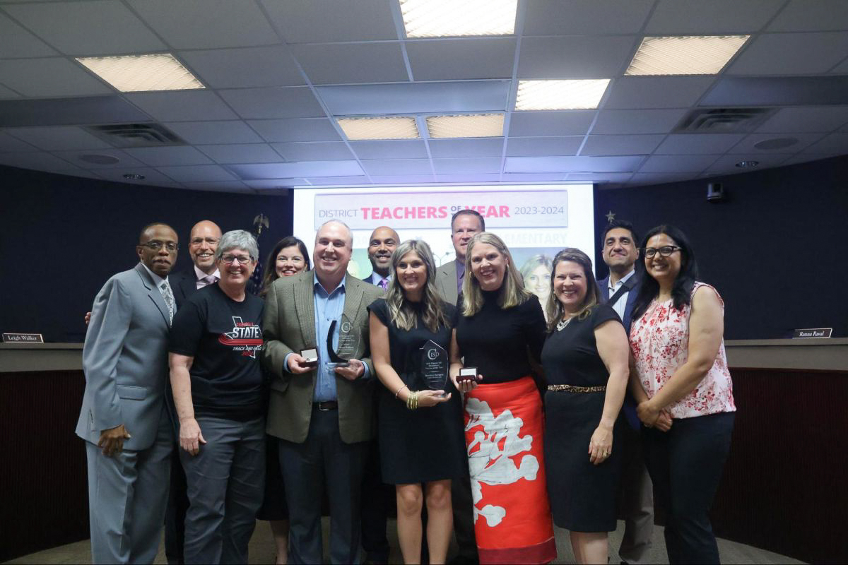 Coppell ISD Board of Trustees presents the District Teachers of the Year award on May 21 at Vonita White Administration Building. The board emphasizes the district’s core values during times of crisis and difficult decision making.