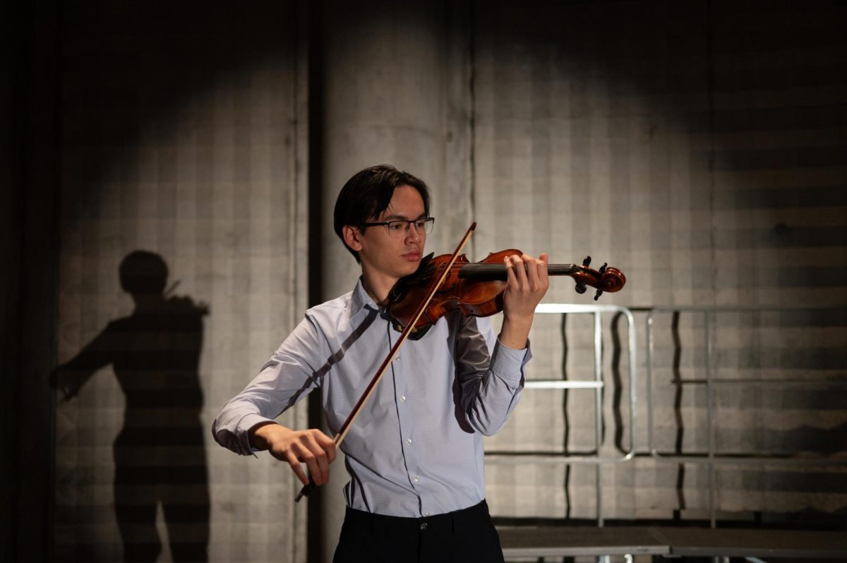 Senior Henry Auxenfans began taking violin lessons at 5 years old, and dedicated the next 13 years of his life to it. 