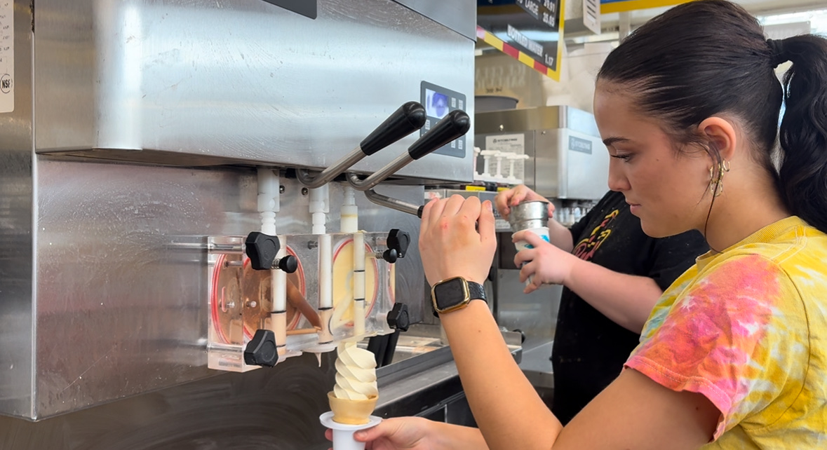 Junior Olivia Page works at her family's well-known ice cream shop, Page Dairy Mart.
