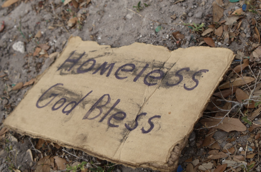 A sign left by an unknown homeless person on East Colonial Drive, four miles from Hagerty.