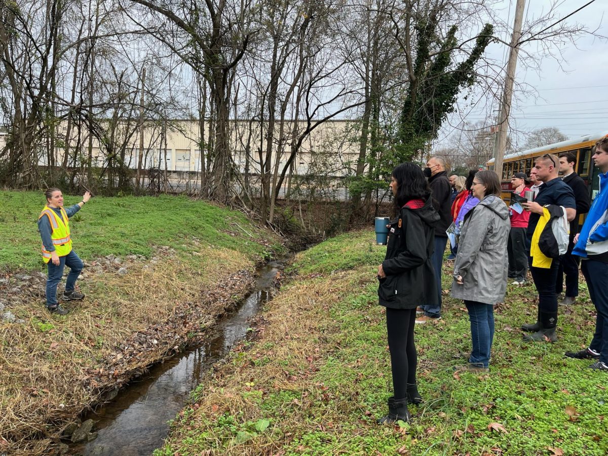 RIVER RESTORATION: Finding the Flint coordinator of six years Hannah Palmer (far left) raises awareness
about the importance of conserving the 344 mile Flint River while giving tours to community members. (Courtesy of Hannah Palmer)