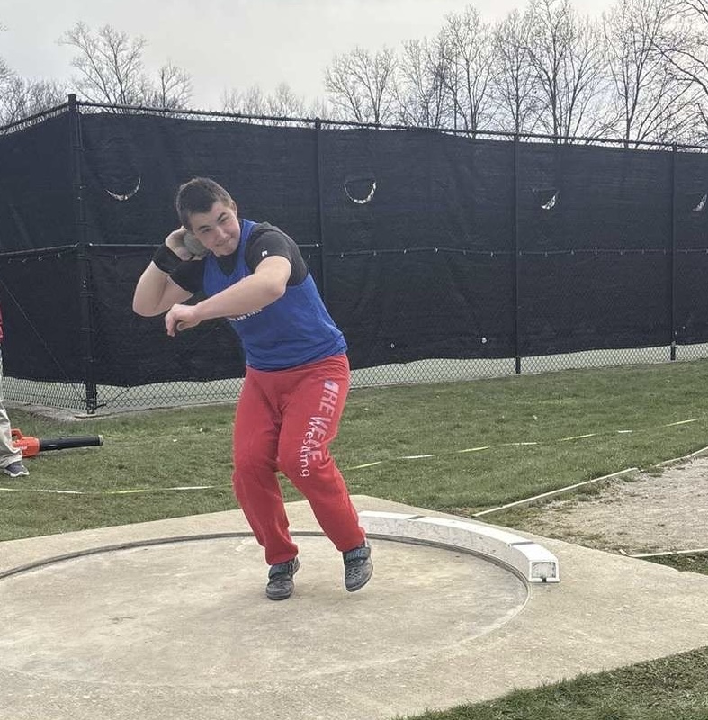 Klein carries out his throwing motion during a home track meet aganist North Royalton.