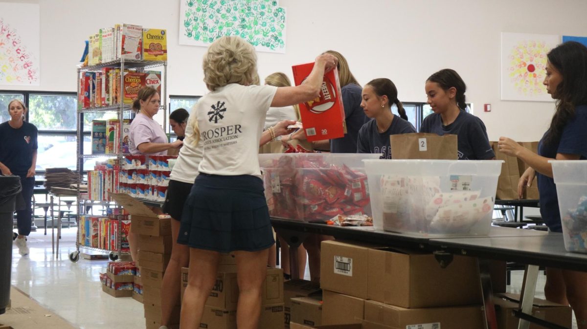 Passing nonperishable food items along the assembly line, volunteers for the Prosper Ladies Association assemble food kits for local families in need. These Prosper ISD students are volunteering for the association's Summer Lunch Program in collaboration with the LovePacs food pantry. "What a lot of people don't understand is, when they think of Prosper, they think of affluence," Vice President Kristi Izquierdo said. “But, Prosper is quite large, and it touches five cities, (including) Frisco, Aubrey, Celina and McKinney. So as those areas grow, so does the need for support.”