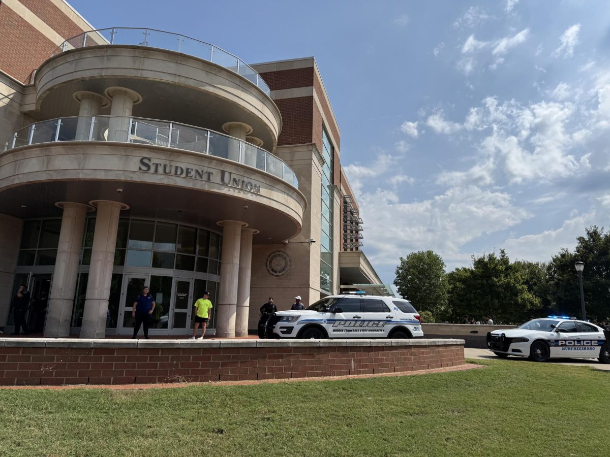 Officials gather outside the Student Union after a false active shooter situation on Sept. 16, 2025.