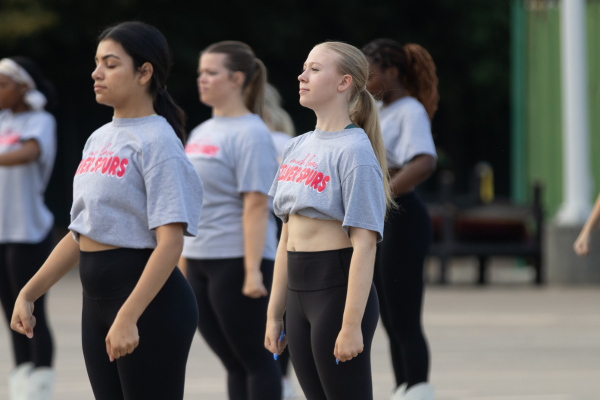 During drill team practice on Aug. 26, senior Karsyn Eubank holds her pose. She earned a spot on varsity drill team, marking her first year as a Silver Spur. 