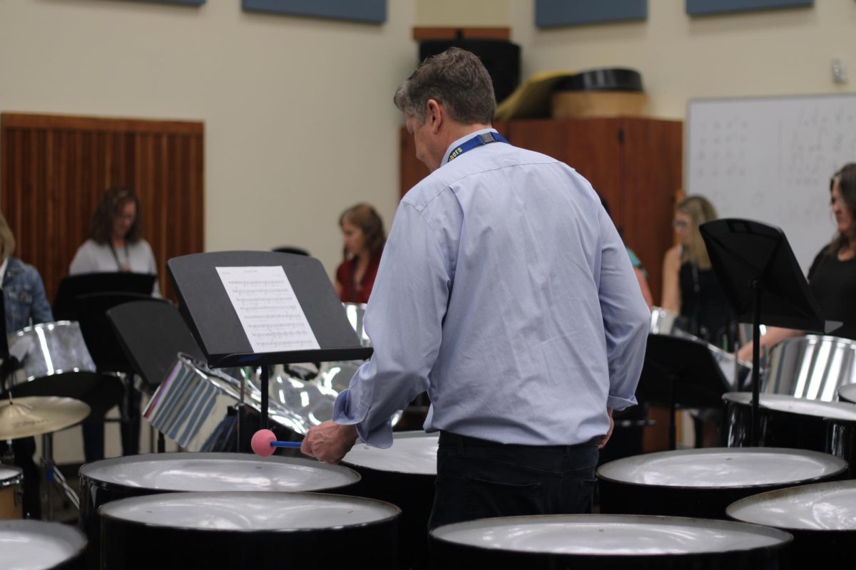 One other benefit of joining the teacher steel drum band is the ability to interact with other teachers outside of their department. “I've been able to put some names to the faces and have conversations with people that I would have probably never really had a conversation with before,” Shannon Montiel said. “It's easy when you're doing something together to make new friendships.”
