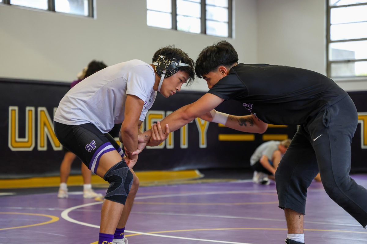 Hayden Ancheta and Brayden Concepcion sparring during practice in the wrestling room on Tuesday, Oct. 7, 2025. (Haley Abarca / Golden Gate Xpress)