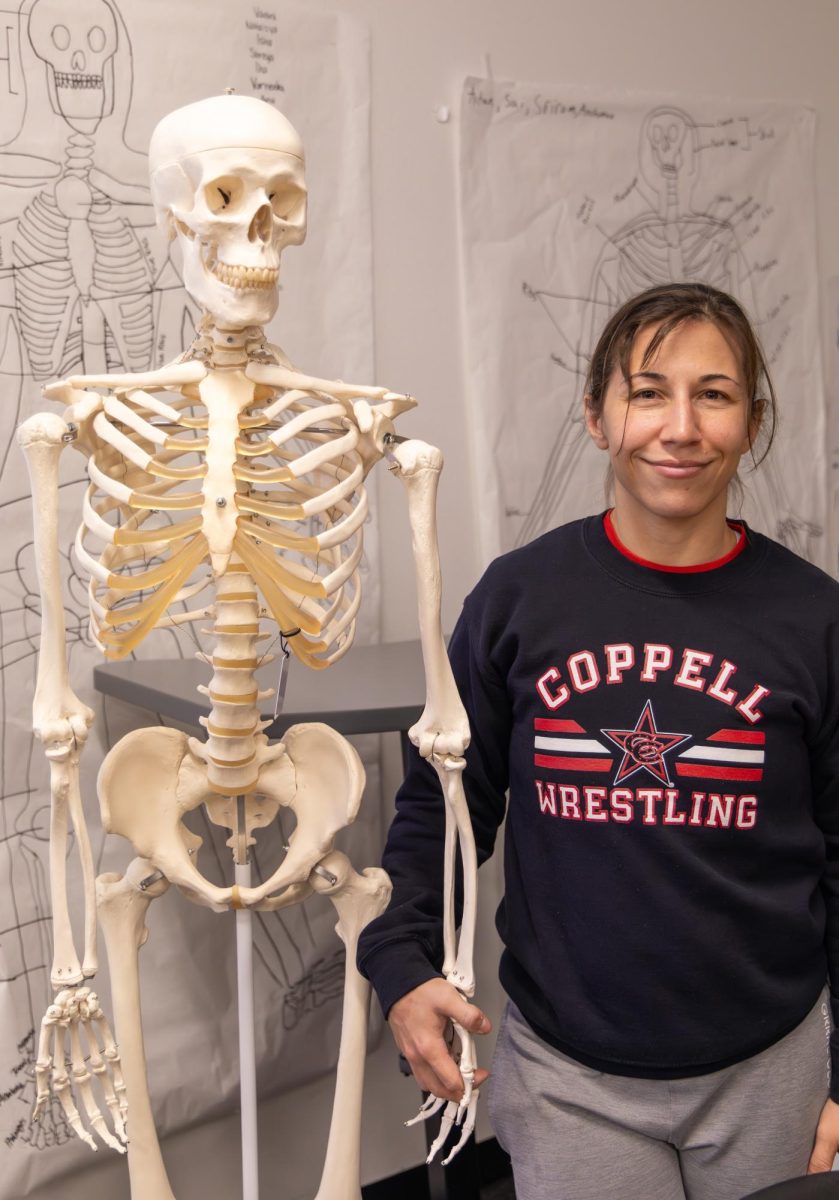 Coppell High School Medical Terminology teacher and assistant girls wrestling coach Maxine Sturch has worked as a 911 dispatcher, coach and teacher. As a 911 dispatcher, this experience shaped how she teaches Medical Terminology and coaches wrestling. 