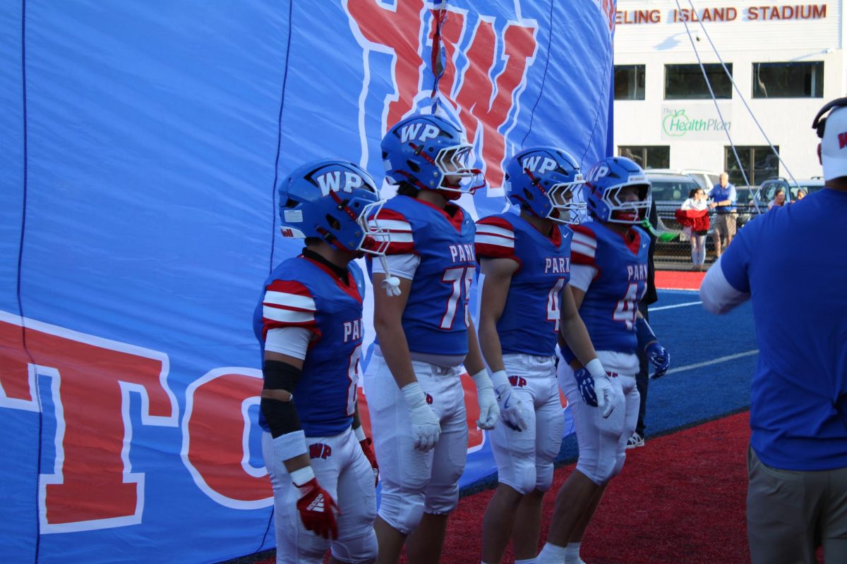 Brennan Wack with his fellow captains before the game.