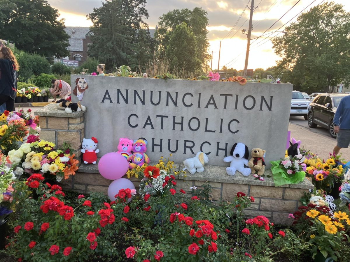 The sun setting on Annunciation Catholic Church, 35 hours after the mass shooting.