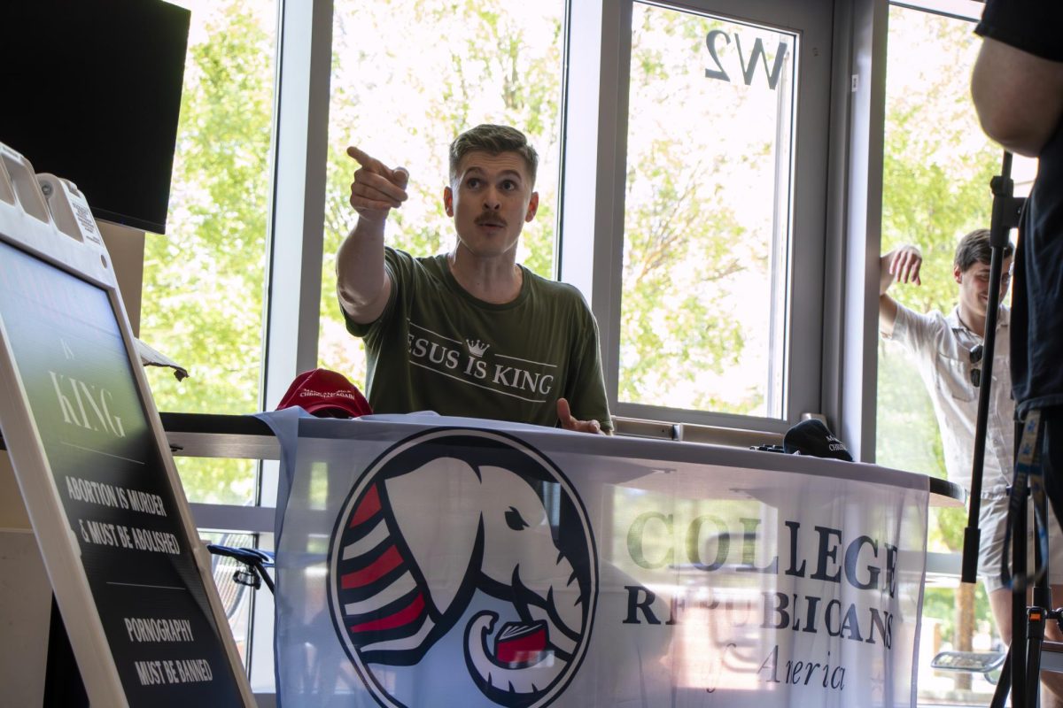 Joshua Haymes points to someone in the crowd while he debates another student about issues the transgender community face on Oct. 1, 2025, in the Student Union.